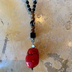 Elegant Beaded Necklace with Red and Black Accents